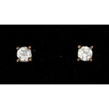 A pair of brilliant cut diamond 9ct white gold stud earrings, diamond weight approx 0.37ct, four