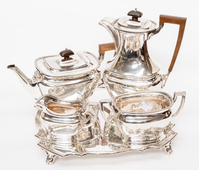 A four piece silver plated tea set to include a teapot, hot water pot, sugar and milk jug, all