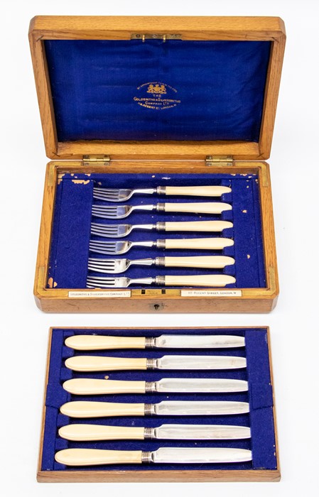 A late Victorian silver plate six piece fish knife and fork set with ivory handles, in fitted oak