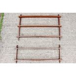 Two contemporary mahogany wall hanging shelves (2)