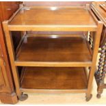 A collection of furniture, comprising a three tier oak tea trolley, an early 20th Century oak