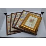 A set of four framed silk embroidered cigarette card silks, in mahogany frames, plus an individual