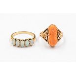 An opal and 14k gold ring, size l1/2, total gross weight approx. 2.1gm along with a carved coral and