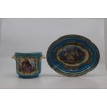 A Sevres-style planter, 19th Century, with twin shell handles, finely painted with a scene of