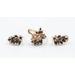 A sapphire and diamond earring and dress 14ct gold ring set, each piece with a flower cluster