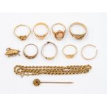 A collection of 9ct and 18ct gold jewellery to include a 9ct gold rope twist chain, along with 9ct