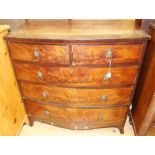 A George III mahogany bow fronted chest of drawers, comprising two short over three long graduated