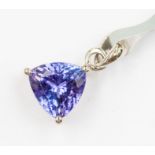 A tanzanite and platinum set pendant, compromising a trillion cut tanzanite of approx. 1 carat, AAAA