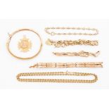 A collection of 9ct gold items to include three 9ct gold bracelets, a 9ct gold fob medallion a/f top