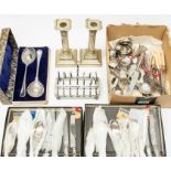 A collection of silver plated items to include candlesticks, toaster, some silver items, napkin ring