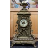 A Victorian style brass cased eight day mantle clock, in the Rococo Revival style C R: size of