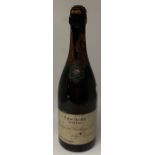 A bottle of Renaudin Bollinger & Co. Extra Quality Very Dry 1911 Vintage Champagne