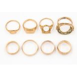 A collection  four 9ct gold bands, two 9ct gold signet rings, a 9ct gold ring mount, combined weight