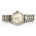 An Omega stainless steel wristwatch, circa 1950's, cream dial diameter approx.30mm, black numbers,