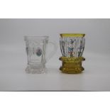 A Bohemian amber flashed glass transparent enamel beaker vase, late 19th Century, of faceted and