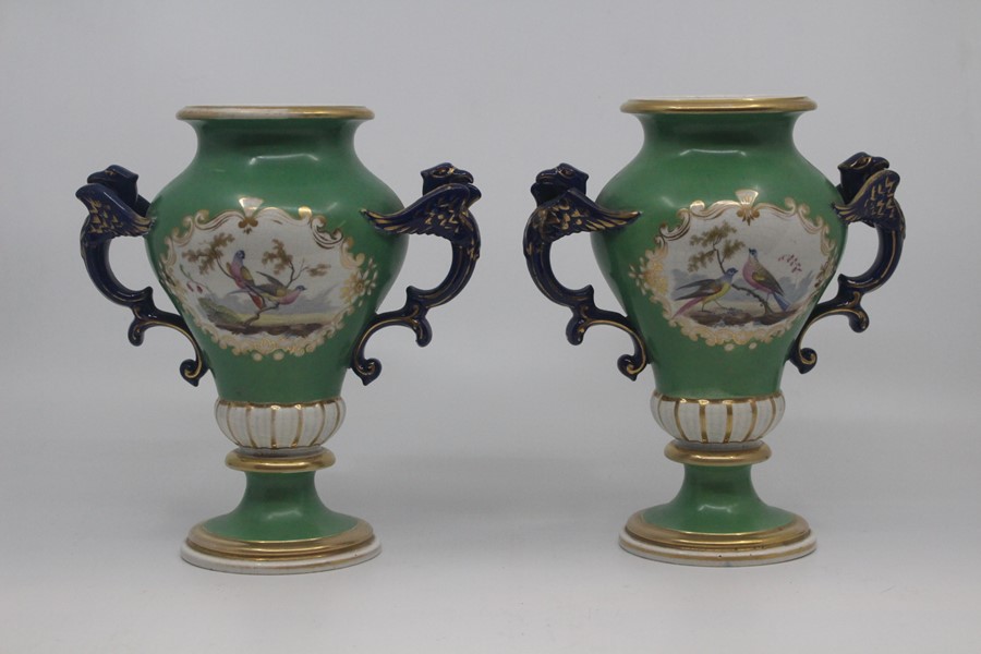 A garniture of English earthenware vases, circa 1850, of lobed ovoid form and decorated with - Image 2 of 2