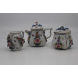 A group of Dresden porcelain, late 19th to early 20th Century, including a flower encrusted teapot