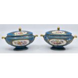 A pair of Sevres-style sauce tureens and covers, of oval form and decorated with flower reserves
