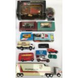 Die cast vehicle collection including Dinky Land Rover, Porsche racing car transporter, etc.
