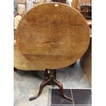 A late 18th Century Georgian oak tripod tilt top table