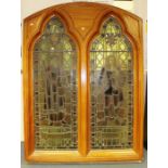 A pair of two light lead glazed windows, each measuring 177cm high, 127cm wide, each window