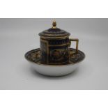 A Vienna porcelain chocolate cup with cover and stand, late 19th/early 20th Century, of