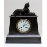 A late 19th Century French black slate mantle clock, eight day with Sphinx design to the top
