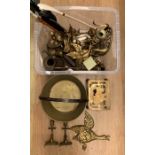 A collection of brass wares examples of a jam pan and candlesticks etc