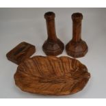 Martin Dutton "Lizard Man", pair of carved oak candlesticks with spreading octagonal bases, carved
