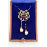 A silver gilt amethyst and pearl necklace, oval cabochon set to the centre with a boder of seed