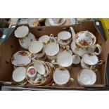 Royal Albert Old Country Roses tea set, including teapot, fourteen cups, seven saucers, six side