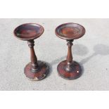 A pair of early Victorian mahogany pedestal fonts, turned bowls, raised on baluster turned column,