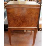 A 19th Century mahogany cellarette, the hinged lidded top enclosing a single interior, lacking