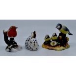 A Royal Crown Derby paperweight first quality of a rabbit figure, a blue tit and chicks plus a robin