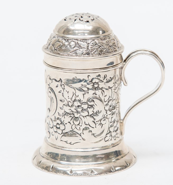 A Victorian silver shaker / pounce pot, the body profusely engraved with scrolling foliage, C-scroll
