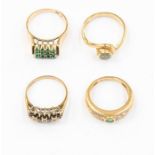 A pair of various 9ct gold  rings to include a and emerald and diamond ring, size L1/2, a an emerald