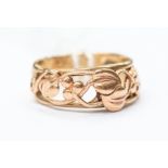 A 9ct rose gold ring with leaf embossed decoration, size K, total gross weight 4grams approx