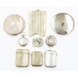 A collection of early 20th Century silver including: Engine turned folding card case; powder puff