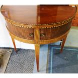 A 19th Century mahogany demilune chequered cabinet, fitted with two tambour doors, raised on