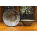 A Laurel Keeley bowl, of rounded form with everted foot ring, incised with stylised lotus flowers