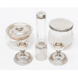 A collection of silver dressing table items comprising: a Victorian silver mounted jar, London,