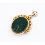A 18ct gold swivel fob, set with bloodstone and carnelian, rope twist border, total length approx.