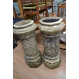 A pair of Victorian Gothic earthenware chimney pots, of octagonal form, lattice work decoration on