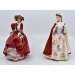 Four Royal Doulton lady figurines to include; Autumn Breezes HN 19342, Top O The Hill HN 1834,