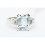 An aquamarine and diamond platinum ring, the claw set rectangular cut aquamarine approx. 4.25ct