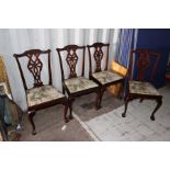 A set of four mahogany 1920's reproduction dining chairs, ball and claw feet