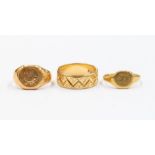 A collection of gold rings to include two 18ct gold signet rings (one cut through) an 18ct gold