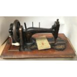Vintage Singer Sewing Machine in Tonbridge type wooden case.