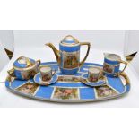 A Bohemian porcelain Vienna-style cabaret coffee set, circa 1925-35, decorated with printed scenes
