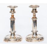 A pair of late 19th Century Sheffield Plate telescopic candlesticks, stamped on foot rim with